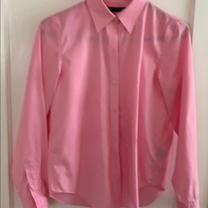 Pink long sleeved shirt.